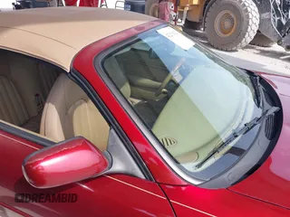 1997 Jaguar XK with VIN SAJGX274XVC004952, listed as a IAAI auction lot 42211023 with 109,889 mi miles and . Bid and sale history available at DreamBid. Image 12.