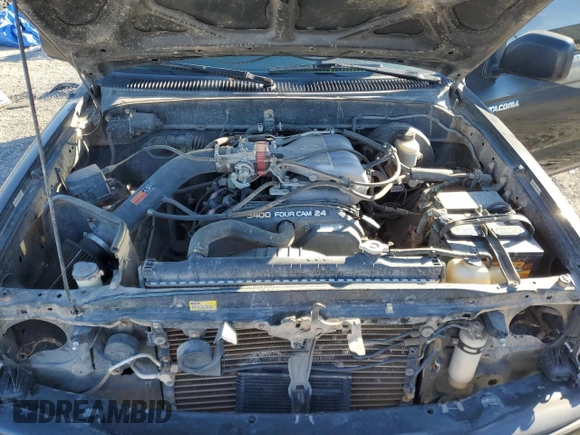 2002 Toyota Tacoma z VIN 5TEWN72N72Z094426, wystawiony jako Copart lot #45386145 z przebiegiem 159 355 mil mil oraz Szkoda całkowita • Salvage title. Historia ofert i sprzedaży dostępna na DreamBid. Obrazek 11.