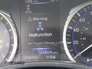 2016 Infiniti Q50 3.0t Premium with VIN JN1EV7AP3GM303498, listed as a IAAI auction lot 42079110 with 164,804 mi miles. Bid and sale history available at carsss.com. Image 14.