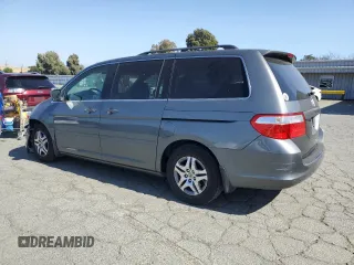 2007 Honda Odyssey EX-L z VIN 5FNRL38677B424117, wystawiony jako Copart lot #58814235 z przebiegiem 188 908 mil mil oraz Szkoda całkowita • Salvage title. Historia ofert i sprzedaży dostępna na DreamBid. Obrazek 2.