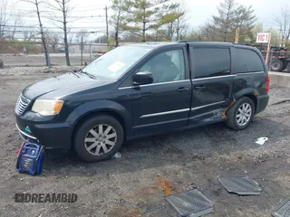 2011 Chrysler Town & Country Touring L with VIN 2A4RR8DG7BR641782, listed as a IAAI auction lot 42042025 with 141,884 mi miles and . Bid and sale history available at DreamBid. Image 2.