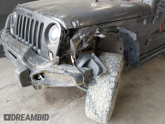 2017 Jeep Wrangler Unlimited Sahara with VIN 1C4BJWEG8HL638067, listed as a IAAI auction lot 41274352 with 57,339 mi miles. Bid and sale history available at carsss.com. Image 6.