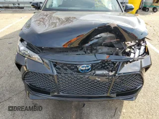 2021 Toyota Avalon Hybrid XSE z VIN 4T1EA1AB9MU007869, wystawiony jako Copart lot #66118102 z przebiegiem 18 195 mil mil oraz . Historia ofert i sprzedaży dostępna na DreamBid. Obrazek 9.