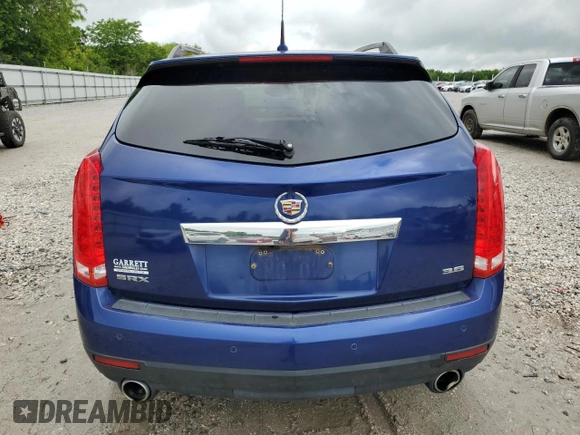 2012 Cadillac SRX Performance Collection with VIN 3GYFNBE35CS579214, listed as a Copart auction lot 54725465 with 114,829 mi miles and Salvage title. Bid and sale history available at DreamBid. Image 6.