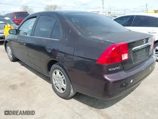 2001 Honda Civic LX with VIN 2HGES165X1H581899, listed as a IAAI auction lot 41989387 with 183,935 mi miles. Bid and sale history available at carsss.com. Image 3.