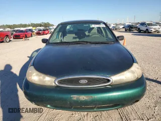 1998 Ford Contour z VIN 1FAFP65L2WK235594, wystawiony jako Copart lot #81118614 z przebiegiem 62 140 mil mil oraz Szkody całkowita. Historia ofert i sprzedaży dostępna na DreamBid. Obrazek 5.