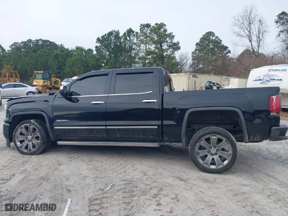 2017 GMC Sierra 1500 Denali with VIN 3GTU2PEJ5HG130000, listed as a IAAI auction lot 41232801 with 104,875 mi miles. Bid and sale history available at carsss.com. Image 14.