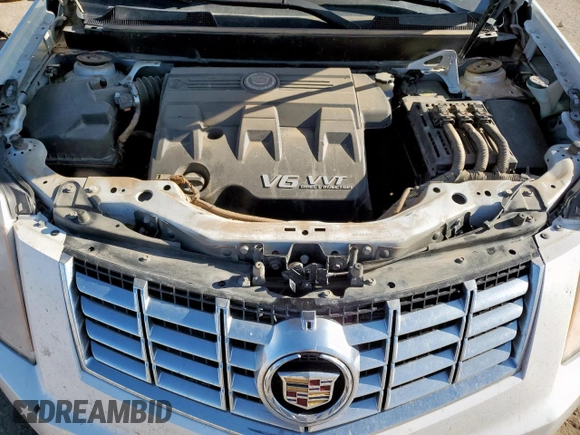 2016 Cadillac SRX Performance Collection with VIN 3GYFNCE37GS573748, listed as a Copart auction lot 57506005 with 136,605 mi miles and Salvage title. Bid and sale history available at DreamBid. Image 12.