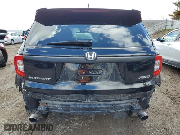 2019 Honda Passport EX-L z VIN 5FNYF8H59KB027590, wystawiony jako Copart lot #53875665 z przebiegiem 57 911 mil mil oraz Czysty tytuł • Clean title. Historia ofert i sprzedaży dostępna na DreamBid. Obrazek 6.