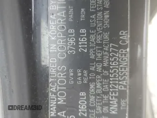 2005 Kia Spectra LX z VIN KNAFE121155165277, wystawiony jako Copart lot #55357155 z przebiegiem Nie podano mil oraz Czysty tytuł • Clean title. Historia ofert i sprzedaży dostępna na DreamBid. Obrazek 12.