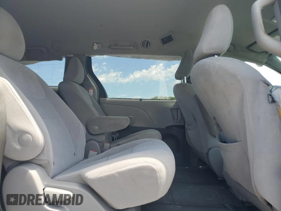 2015 Toyota Sienna LE with VIN 5TDJK3DC4FS107711, listed as a Copart auction lot 57693005 with 141,370 mi miles and Salvage title. Bid and sale history available at DreamBid. Image 11.