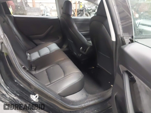 2018 Tesla Model 3 Long Range Battery with VIN 5YJ3E1EB8JF113566, listed as a IAAI auction lot 41726484 with 91,255 mi miles and . Bid and sale history available at DreamBid. Image 8.