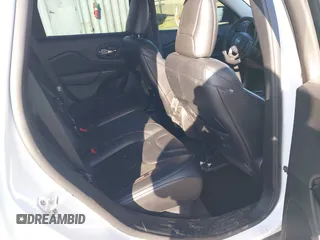 2021 Jeep Cherokee Trailhawk with VIN 1C4PJMBX9MD105888, listed as a IAAI auction lot 42065175 with 55,469 mi miles and . Bid and sale history available at DreamBid. Image 8.