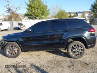 2021 Jeep Grand Cherokee Limited z VIN 1C4RJFBG8MC536748, wystawiony jako IAAI lot #41820268 z przebiegiem 49 882 mil mil oraz . Historia ofert i sprzedaży dostępna na DreamBid. Obrazek 14.