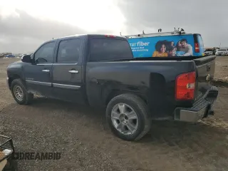 2013 Chevrolet Silverado 1500 LT with VIN 3GCPCSE00DG372708, listed as a Copart auction lot 51591465 with 210,934 mi miles and Salvage Title. Bid and sale history available at DreamBid. Image 2.