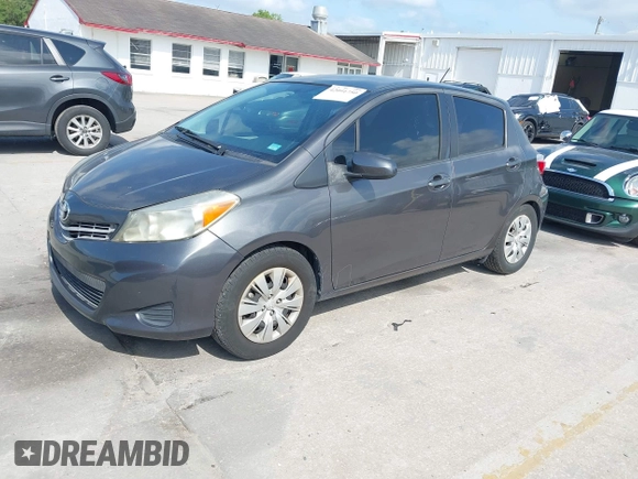 2012 Toyota Yaris L with VIN JTDKTUD38CD540219, listed as a IAAI auction lot 42091750 with 152,878 mi miles. Bid and sale history available at carsss.com. Image 2.