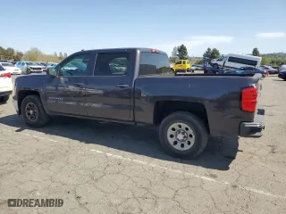 2014 Chevrolet Silverado 1500 LT with VIN 3GCPCREC0EG389917, listed as a Copart auction lot 52718365 with 153,269 mi miles and Salvage Title. Bid and sale history available at carsss.com. Image 2.