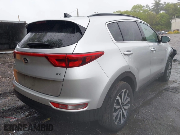 2018 Kia Sportage EX z VIN KNDPNCAC8J7309766, wystawiony jako IAAI lot #42219243 z przebiegiem 90 745 mil mil oraz . Historia ofert i sprzedaży dostępna na DreamBid. Obrazek 4.