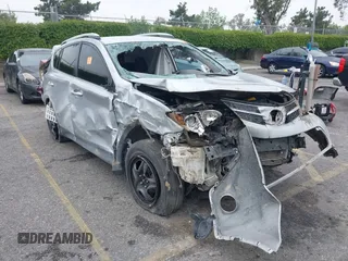 2014 Toyota RAV4 LE with VIN 2T3ZFREVXEW106571, listed as a IAAI auction lot 42161389 with Not provided miles and . Bid and sale history available at DreamBid. Image 6.