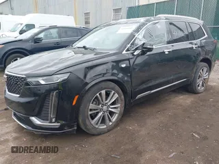 2020 Cadillac XT6 FWD Premium Luxury z VIN 1GYKPCRS6LZ148058, wystawiony jako IAAI lot #42416949 z przebiegiem 79 318 mil mil oraz . Historia ofert i sprzedaży dostępna na DreamBid. Obrazek 2.