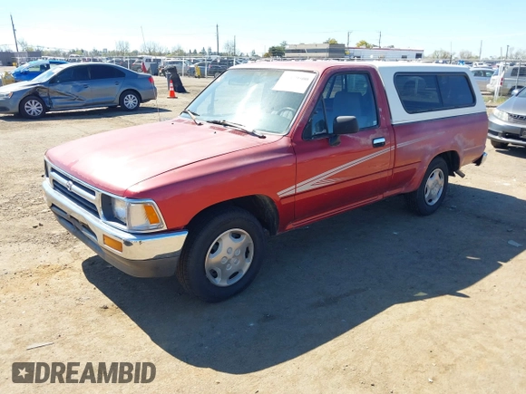 1992 Toyota Pickup DLX z VIN 4TARN81PXNZ030799, wystawiony jako IAAI lot #41879500 z przebiegiem 221 198 mil mil oraz . Historia ofert i sprzedaży dostępna na DreamBid. Obrazek 2.