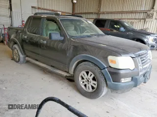 2007 Ford Explorer Sport Trac XLT z VIN 1FMEU31K57UA64013, wystawiony jako Copart lot #57179715 z przebiegiem 268 877 mil mil oraz Czysty tytuł • Clean title. Historia ofert i sprzedaży dostępna na DreamBid. Obrazek 4.