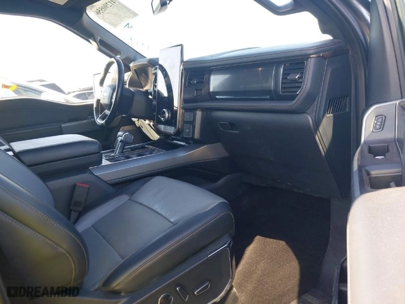 2022 Ford F-150 Lightning Pro with VIN 1FTVW1EL9NWG16717, listed as a IAAI auction lot 41290556 with 24,865 mi miles. Bid and sale history available at carsss.com. Image 5.