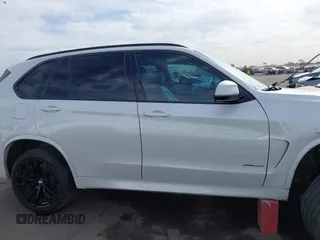 2017 BMW X5 xDrive50i с VIN 5UXKR6C3XH0J85028, выставлен на аукционе IAAI как лот 41889220 с пробегом 107 105 миль миль и . История ставок и продаж доступна на DreamBid. Изображение 13.