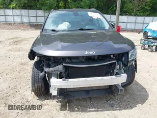 2019 Jeep Compass Latitude with VIN 3C4NJDBB8KT748588, listed as a IAAI auction lot 42224482 with 70,810 mi miles and . Bid and sale history available at DreamBid. Image 6.
