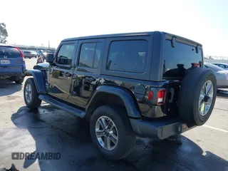 2020 Jeep Wrangler Unlimited Sahara with VIN 1C4HJXEN7LW230214, listed as a IAAI auction lot 41812466 with 59,004 mi miles. Bid and sale history available at carsss.com. Image 3.