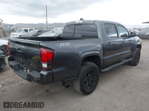 2022 Toyota Tacoma SR with VIN 3TYAX5GN8NT066318, listed as a IAAI auction lot 41739981 with 50,186 mi miles and . Bid and sale history available at DreamBid. Image 4.