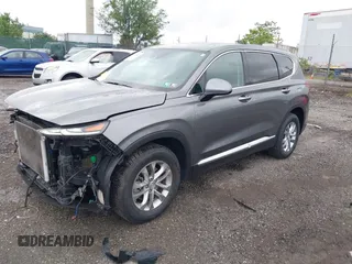 2019 Hyundai Santa Fe SEL z VIN 5NMS3CAD7KH035429, wystawiony jako IAAI lot #42323641 z przebiegiem 60 909 mil mil oraz . Historia ofert i sprzedaży dostępna na DreamBid. Obrazek 2.