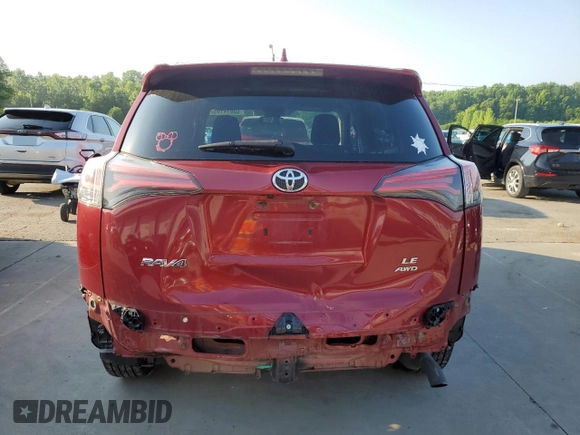 2018 Toyota RAV4 LE with VIN 2T3BFREV7JW723938, listed as a Copart auction lot 62814195 with 107,051 mi miles and Salvage title. Bid and sale history available at DreamBid. Image 6.