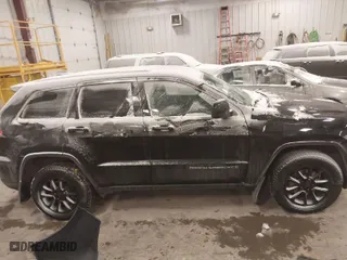 2016 Jeep Grand Cherokee Laredo with VIN 1C4RJFAGXGC311561, listed as a IAAI auction lot 41364024 with 134,042 mi miles. Bid and sale history available at carsss.com. Image 13.