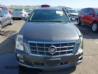 2008 Cadillac STS RWD z VIN 1G6DW67V980103498, wystawiony jako IAAI lot #41950340 z przebiegiem 92 859 mil mil oraz . Historia ofert i sprzedaży dostępna na DreamBid. Obrazek 12.