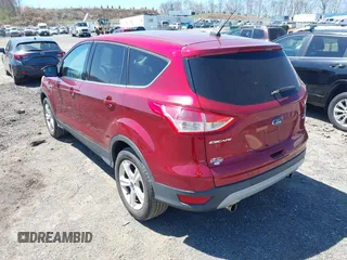 2013 Ford Escape SE with VIN 1FMCU9GX3DUB27683, listed as a IAAI auction lot 42068155 with 94,924 mi miles and . Bid and sale history available at DreamBid. Image 3.