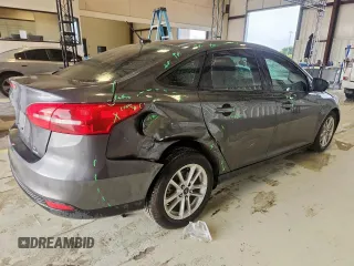 2018 Ford Focus SE with VIN 1FADP3FE0JL311760, listed as a Copart auction lot 63621755 with 81,000 mi miles and Salvage title. Bid and sale history available at DreamBid. Image 3.