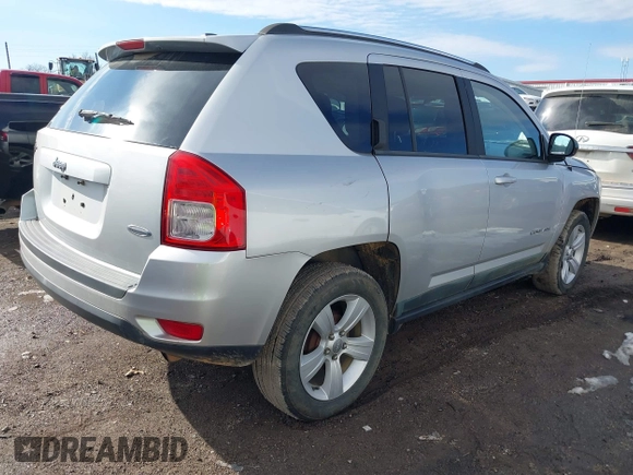 2011 Jeep Compass with VIN 1J4NT1FB4BD252724, listed as a IAAI auction lot 41247389 with 162,028 mi miles. Bid and sale history available at carsss.com. Image 4.