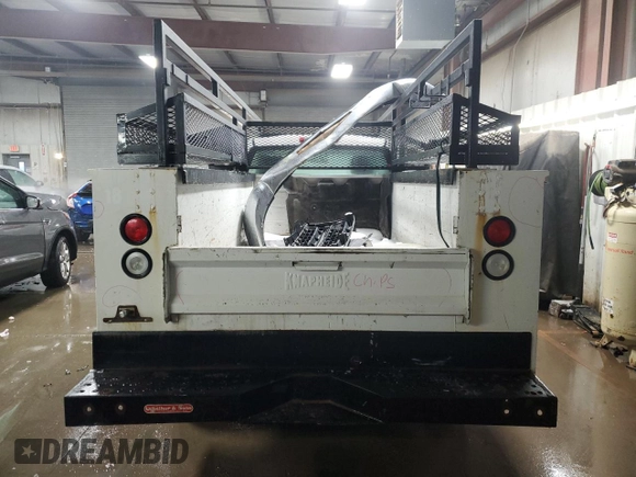 2009 Chevrolet Silverado 1500 with VIN 1GBHC44KX9F170295, listed as a Copart auction lot 45369965 with 166,640 mi miles and Salvage Title. Bid and sale history available at DreamBid. Image 6.