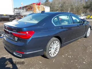2018 BMW 7 Series 740i xDrive with VIN WBA7E4C54JGV23736, listed as a IAAI auction lot 41457470 with 70,243 mi miles. Bid and sale history available at carsss.com. Image 4.