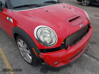 2009 MINI Cooper Hardtop S with VIN WMWMF73549TW87458, listed as a IAAI auction lot 42051759 with 135,309 mi miles. Bid and sale history available at carsss.com. Image 6.