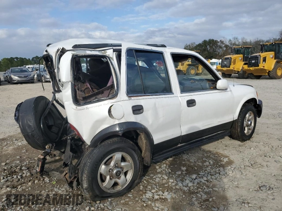1999 Kia Sportage with VIN KNDJA7233X5600719, listed as a Copart auction lot 80529384 with 56,657 mi miles and Salvage Title. Bid and sale history available at carsss.com. Image 3.