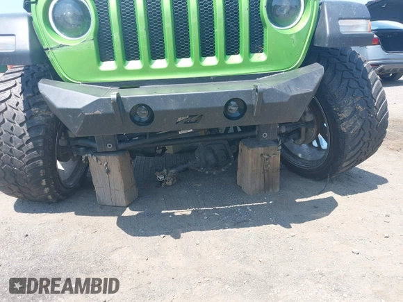 2018 Jeep Wrangler Sport with VIN 1C4GJXAG1JW271695, listed as a IAAI auction lot 42472603 with 105,460 mi miles and . Bid and sale history available at DreamBid. Image 6.