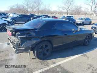 2013 Dodge Challenger R/T with VIN 2C3CDYBT6DH614418, listed as a IAAI auction lot 41583274 with 63,409 mi miles. Bid and sale history available at carsss.com. Image 6.