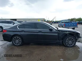 2020 BMW 5 Series 530i with VIN WBAJR3C08LWW77822, listed as a IAAI auction lot 41880376 with 52,533 mi miles and . Bid and sale history available at carsss.com. Image 14.