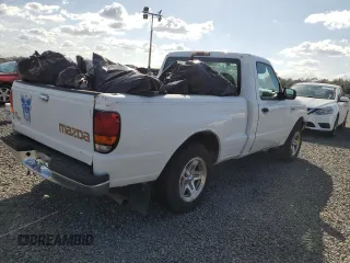 1999 Mazda B-Series 2WD Truck SX with VIN 4F4YR12C4XTM40289, listed as a Copart auction lot 77544354 with 192,046 mi miles and Salvage Title. Bid and sale history available at carsss.com. Image 3.