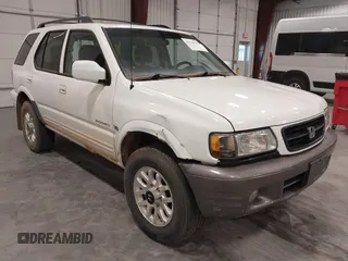 2000 Honda Passport z VIN 4S6DM58WXY4415555, wystawiony jako IAAI lot #41520785 z przebiegiem 105 196 mil mil oraz . Historia ofert i sprzedaży dostępna na DreamBid. Obrazek 1.