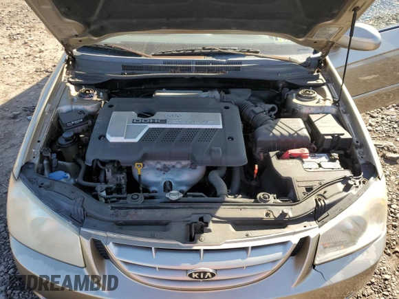 2006 Kia Spectra EX z VIN KNAFE121365269433, wystawiony jako Copart lot #56634735 z przebiegiem 86 551 mil mil oraz Szkoda całkowita • Salvage title. Historia ofert i sprzedaży dostępna na DreamBid. Obrazek 11.