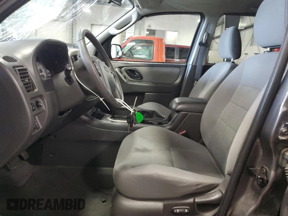 2005 Ford Escape XLT with VIN 1FMYU93135KD88798, listed as a Copart auction lot 69311714 with 81,126 mi miles and Salvage Title. Bid and sale history available at carsss.com. Image 7.
