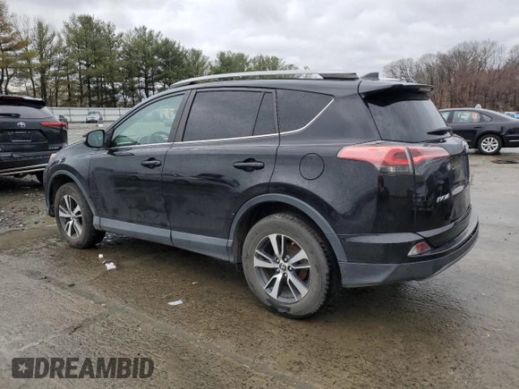2018 Toyota RAV4 XLE with VIN 2T3RFREVXJW723057, listed as a Copart auction lot 49176705 with 5,980 mi miles and Salvage Title. Bid and sale history available at DreamBid. Image 2.